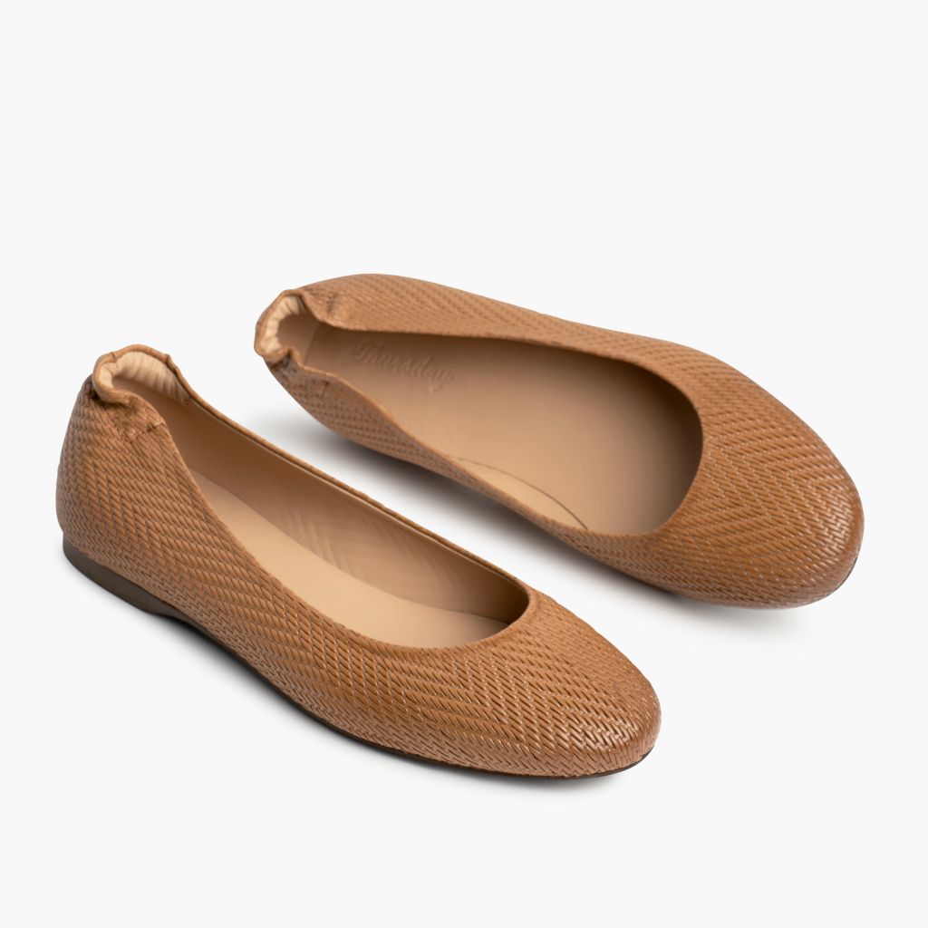 High-Traction Rubber Outsole & Lug Tread Pattern on Women's Scrunch Tan Embossed Leather Boots