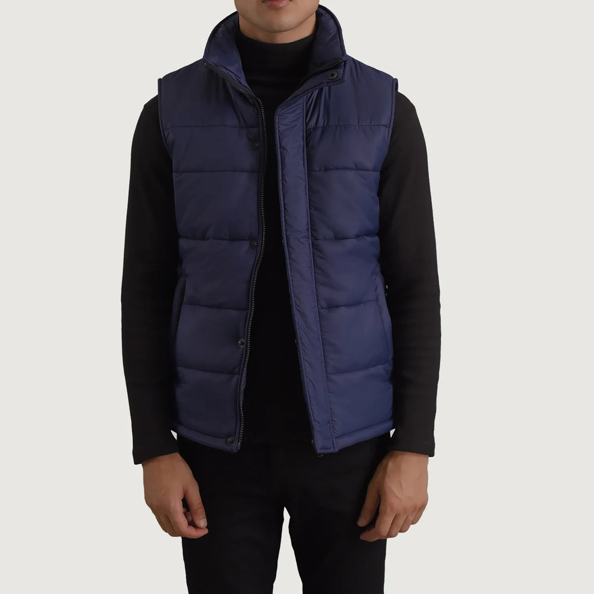 Bryan Blue Puffer Vest in Blue Full-Grain Leather - Front Profile View &amp; Tailored Silhouette | Buy Online