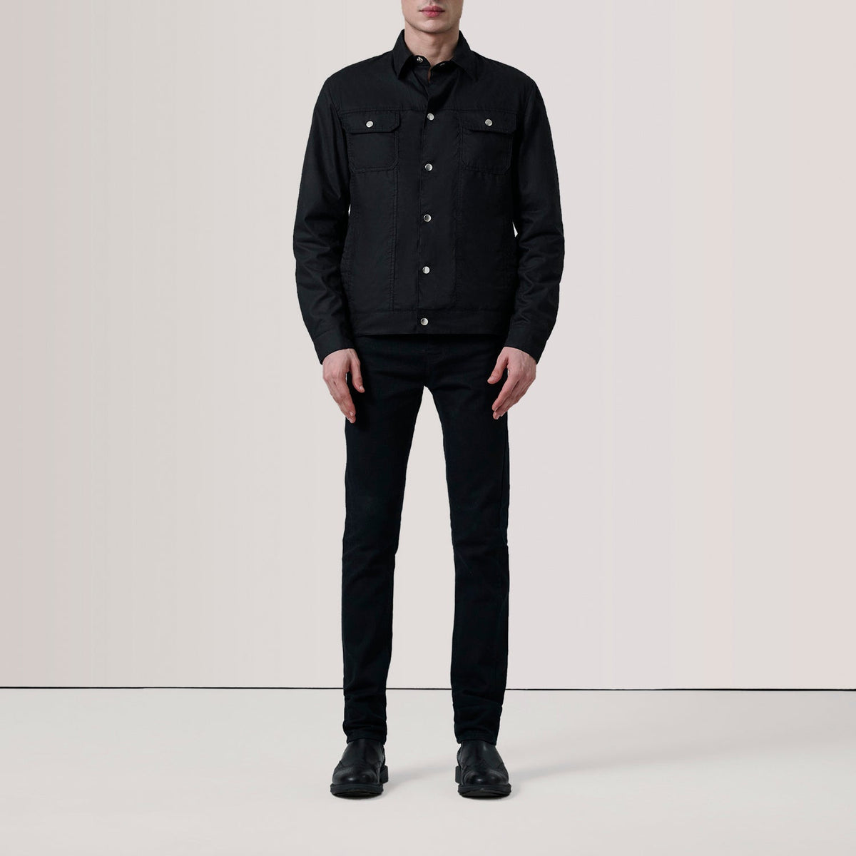 
Black Waxed Cotton Canvas Leather Jacket - Back View Showing Tailored Shoulder Fit & Clean Hemline