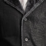 
Close-Up Detail of Notch & Button Hardware on Kolby Distressed Black Shearling Long Coat