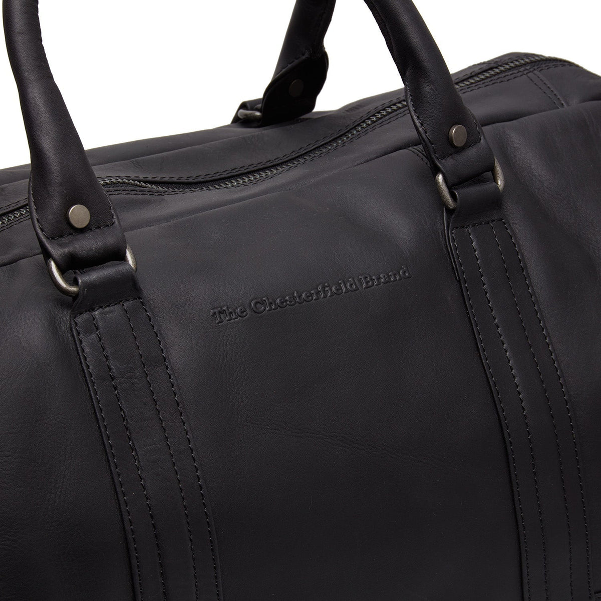 
Solid Antique Brass Hardware & Heavy-Duty Dual Zipper Detail on Melbourne Full-Grain Leather Weekender Bag