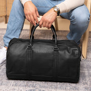 
Classic 100% Full-Grain Leather Duffle Bag - Rear Perspective Showing Reinforced Leather Straps & Stitching