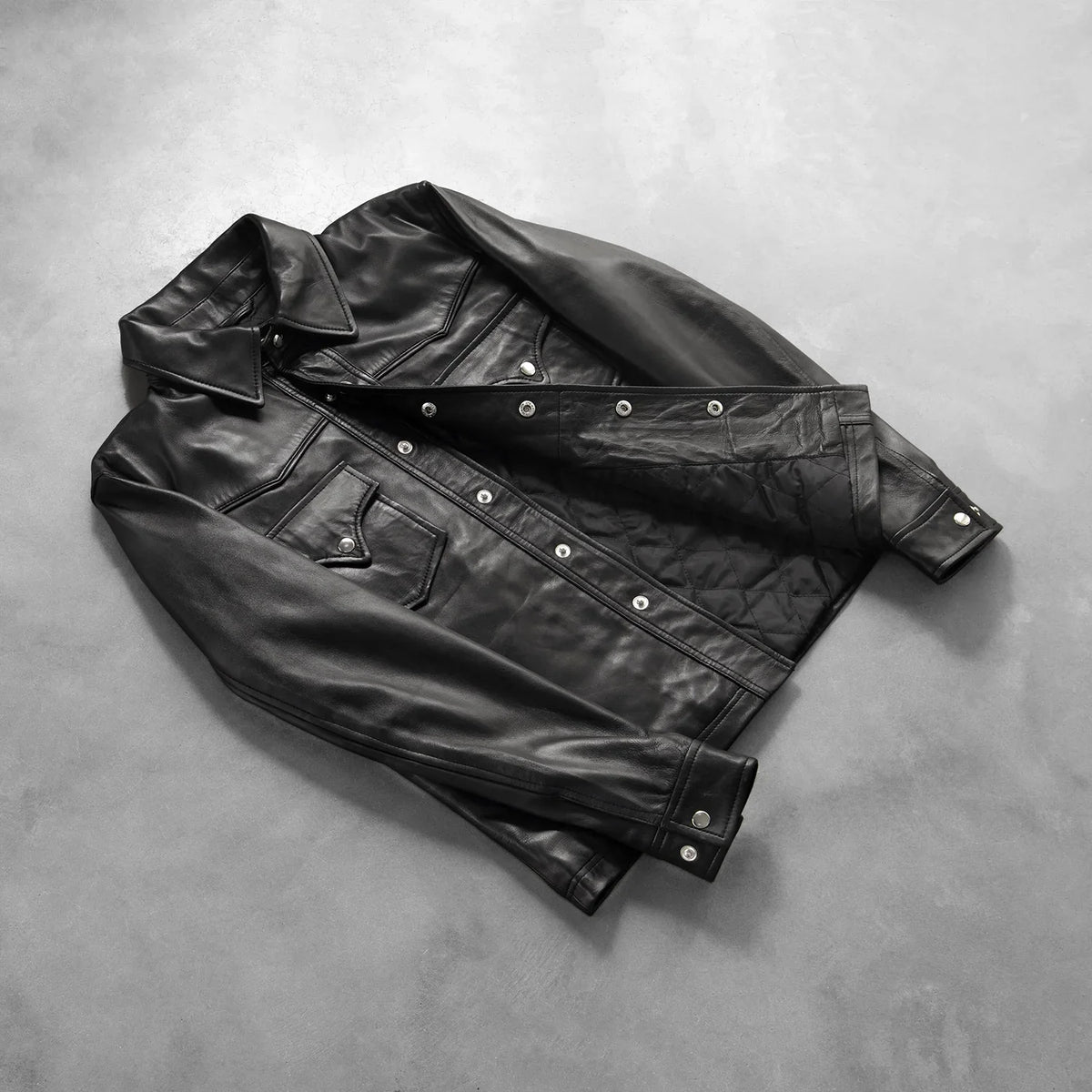 Button &amp; Hem Craftsmanship Construction Detail on Men's Ranchson Black Leather Shirt