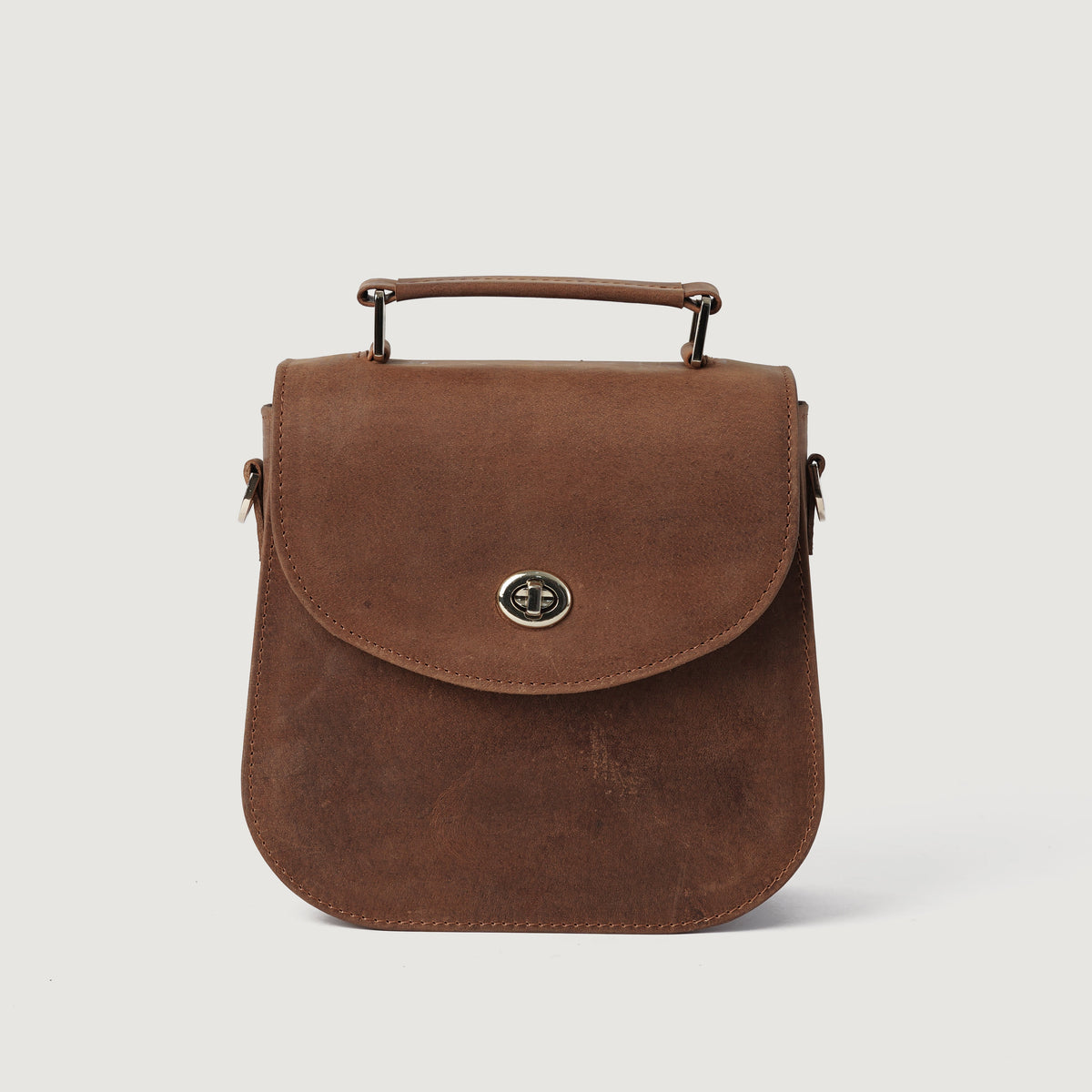 
The Sandra Vintage Tan Leather Saddle Bag For Women - Structured Side Profile Showing Gusset Depth & Expansion Capacity